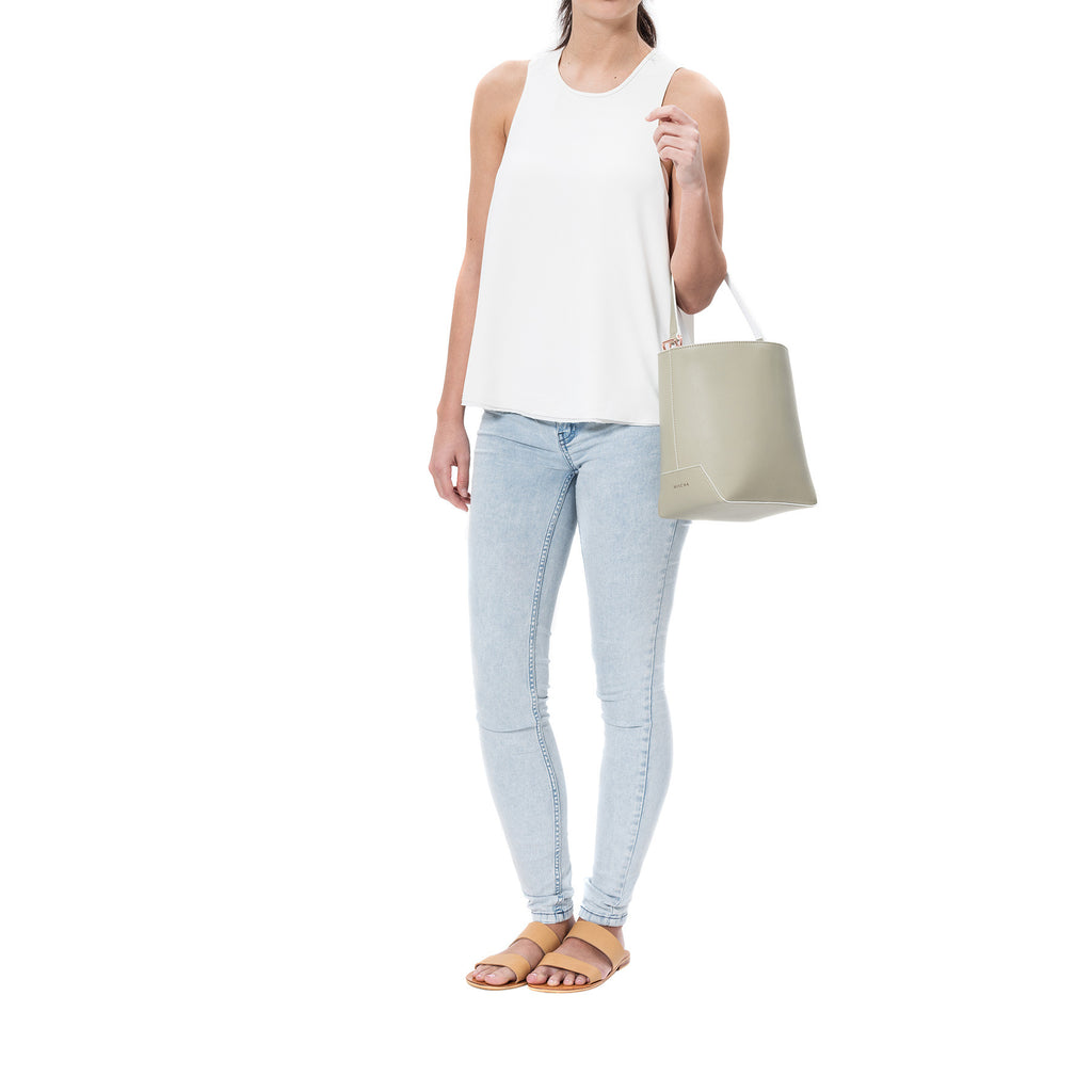 MISCHA Leather Bucket Bag - Stone (model shot)